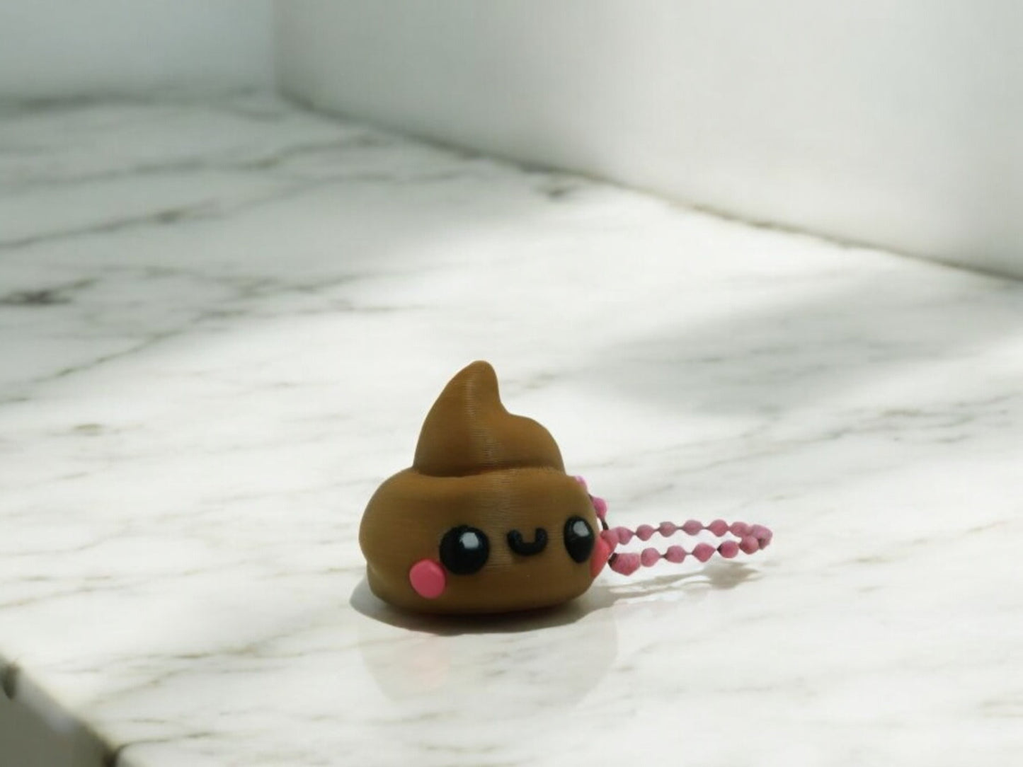 Poo and Toilet Paper keyrings